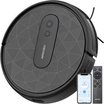 A black robot vacuum cleaner with a geometric pattern on its top surface, shown with a smartphone displaying an app interface and a remote control.