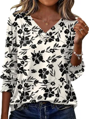Productafbeelding van Dames blouse met driekwart mouwen, V-hals en bloemenprint