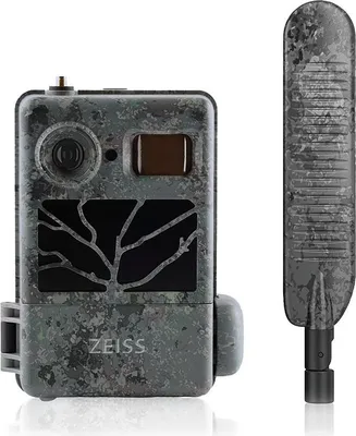 A camouflage-patterned camera and an antenna are displayed against a white background.