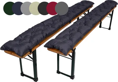 Two dark gray tufted bench cushions are placed on wooden beer garden benches against a white background.