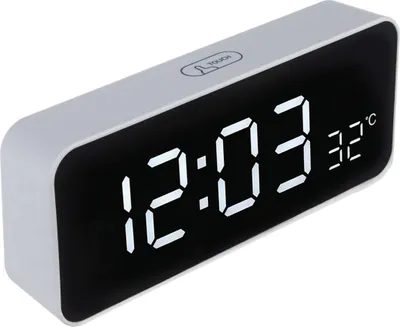 A digital clock displaying the time and temperature.