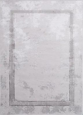 A close-up view of a rug with a rectangular border.