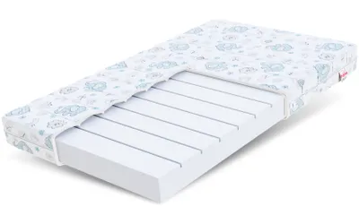 A mattress with a cutaway showing its internal structure, placed on a white background.