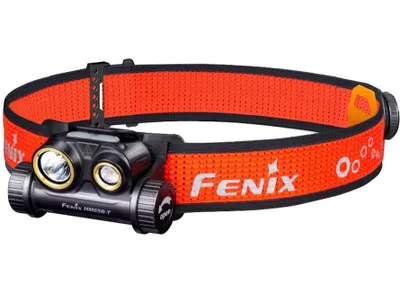 A Fenix HM65R-T headlamp with an orange strap is shown against a white background.