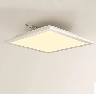 A square LED panel light is mounted on a ceiling.