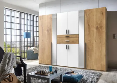 Produktbild von Kleiderschrank "Odessa" aus Spanplatte in Plankeneiche-Nachbildung mit 2 Schubladen und 8 Türen. Abmessungen (B/H/T) 270x208x58 cm