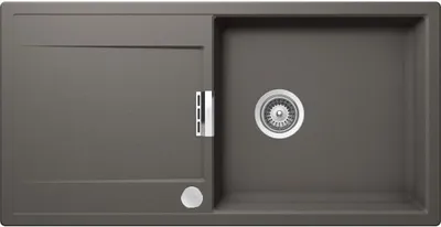 A top-down view of a gray kitchen sink with a drainer and a sink basin.