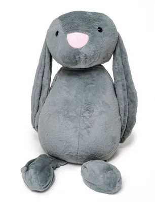 A plush toy rabbit is shown sitting against a white background.