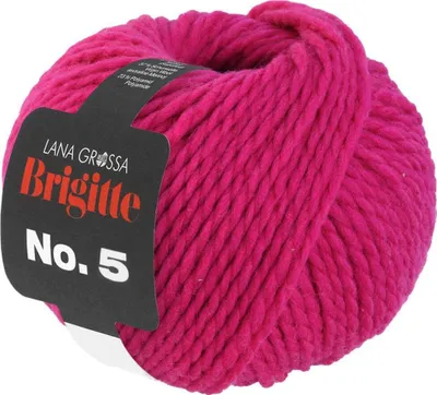 A ball of fuchsia-colored yarn with a black label.