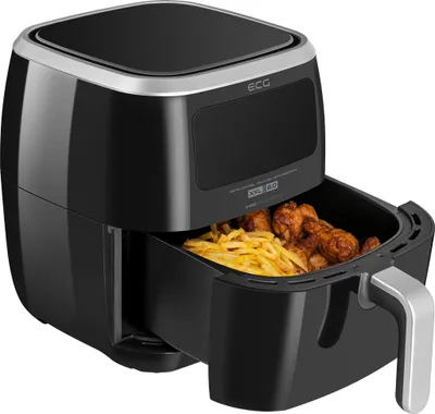 A black air fryer with its basket pulled out, showing fried chicken and french fries inside.