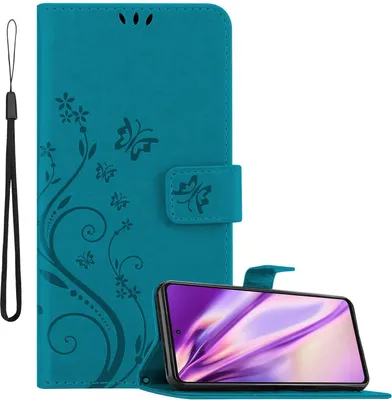 A teal flip phone case with a floral and butterfly design is shown open, with a smartphone inside. A black wrist strap is attached to the left side of the case.