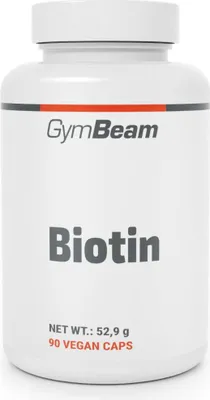 A white bottle of GymBeam Biotin supplements against a white background.