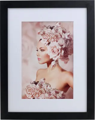 A framed picture of a woman with a floral headdress and dress.