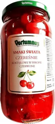 A jar of red cocktail cherries in syrup.