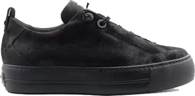 A studio shot of a single black sneaker.