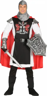 A man wearing a medieval warrior costume, holding a sword and shield.