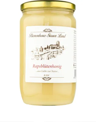 A jar of honey on a white background.