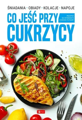 A cookbook cover with a picture of a healthy meal.