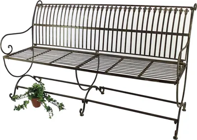 A metal garden bench with a potted plant underneath.