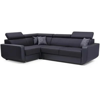 A dark gray sectional sofa with adjustable headrests and decorative pillows is shown against a white background.