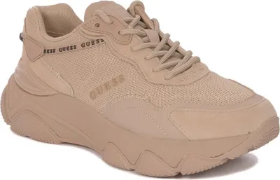 A single beige Guess sneaker is shown against a white background.