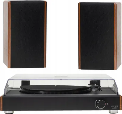 A turntable and two speakers are displayed against a white background.