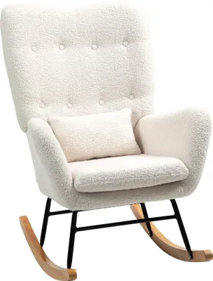 A cream-colored rocking chair with a textured fabric and a small lumbar pillow.