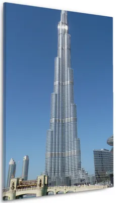 Produktbild von Wallario Premium Leinwandbild Wolkenkratzer in Dubai in Größe 60 x 90 cm