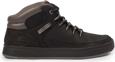 A black Timberland boot is shown against a white background.