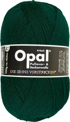 A ball of dark green yarn with a label.