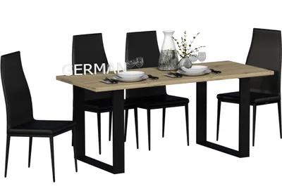A dining table with four chairs, set with plates, glasses, and a vase.