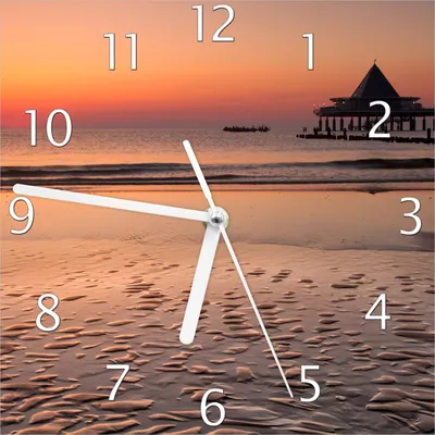 Produktbild von Wallario Design Wanduhr Strand am Abend - Seebrücke am Ostseebad Heringsdorf aus Echtglas, Größe 20 x 20 cm
