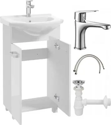 A white bathroom vanity with a sink, faucet, and plumbing accessories, laid out for display.