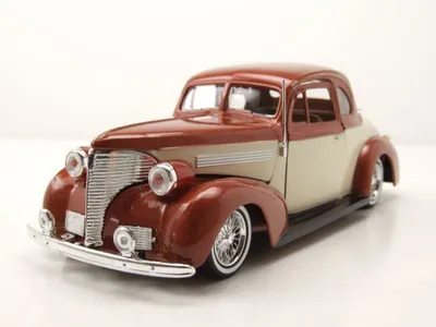 Produktbild von Motormax 79028 Chevrolet Coupe 1939 gold weiß 1:24