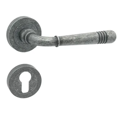 A door handle set with a keyhole escutcheon, presented against a white background.