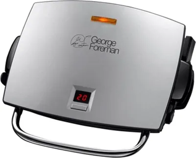 A George Foreman grill is shown from a slightly elevated front-facing angle against a white background.