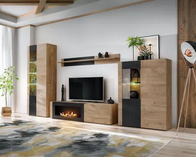 A modern living room with a wall unit featuring a fireplace, television, and storage cabinets.
