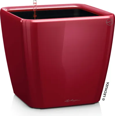 A red square planter with a water level indicator.