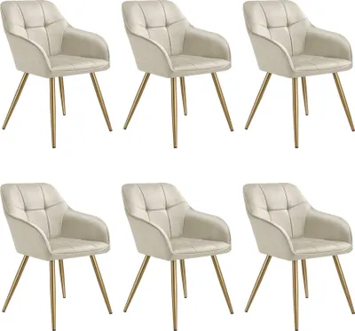 Six beige upholstered dining chairs with gold legs are arranged in two rows of three against a white background.