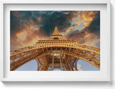 Produktbild von Der Eiffelturm im Sonnenschein– Wandbild mit Rahmen – Gerahmtes Bild  – Wanddekoration – 70x50 cm –  Weiß Rahmen