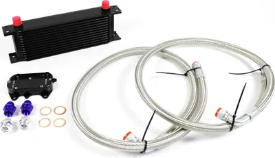 A car engine oil cooler kit with hoses and fittings, laid out on a white background.