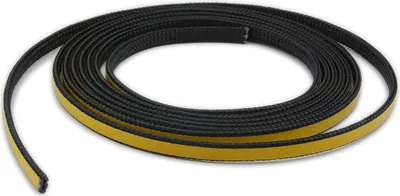 A coiled black sealing strip with a yellow adhesive backing on a white background.