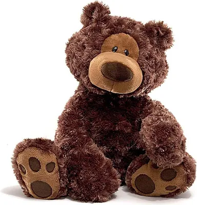 A brown teddy bear sitting on a white background.