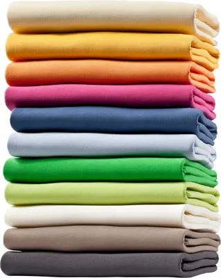A stack of folded fabric sheets in various colors.