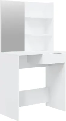 A white vanity table with a mirror and shelves.