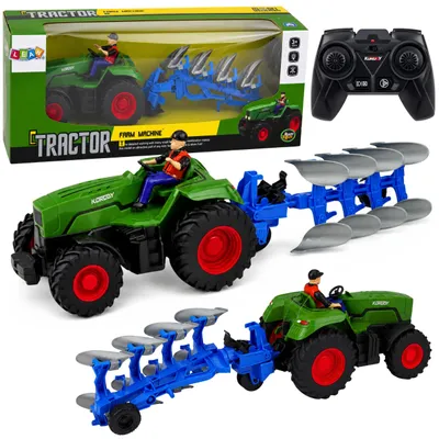 Produktbild von RC-Traktor mit Pflug und Bauernfigur, im Maßstab 1:24