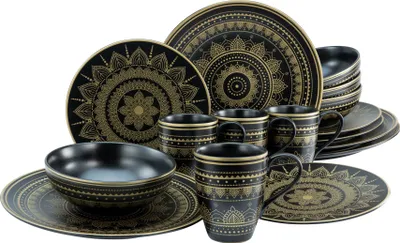 A set of black and gold mandala-patterned dinnerware, including plates, bowls, and mugs, is arranged on a white background.