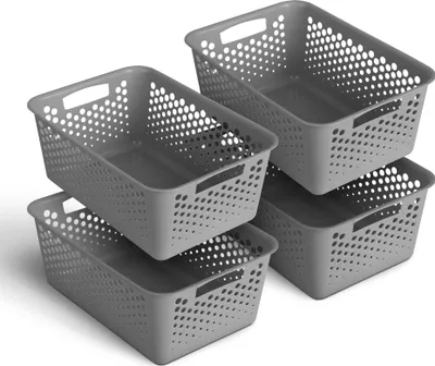 Four gray storage baskets are stacked and arranged in a group against a white background.