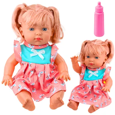 Productafbeelding van Babypop met kleurrijke jurk Ponyflesgeluid