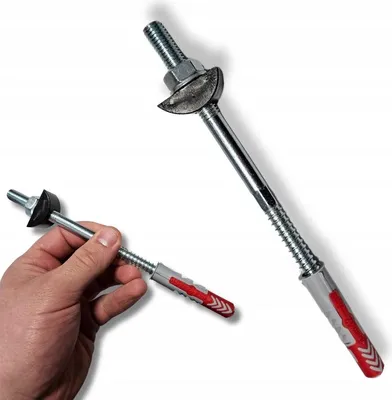 A hand holding a metal post anchor with a plastic dowel, with a larger version of the same anchor in the background.